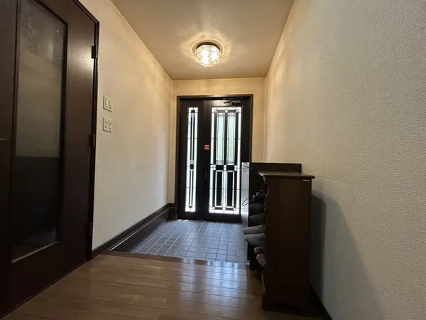 玄関（（一戸建部分）