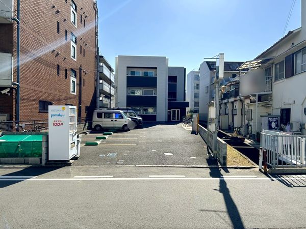 ワコーレヴィータ東園田+時間貸駐車場 前面道路含む外観 ワコーレヴィータ東園田+時間貸駐車場 前面道路含む外観