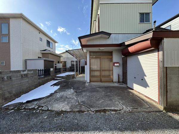 石巻市東中里2丁目 土地 前面道路含む外観