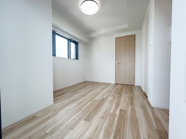 オープンレジデンシア栄THE COURT 寝室