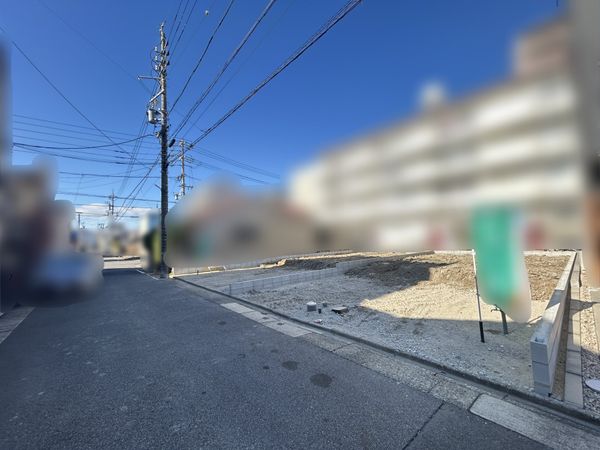 北区長喜町3丁目 2号棟 前面道路含む外観